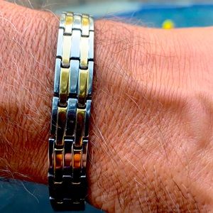 New Stainless Steel and gold toned bracelet